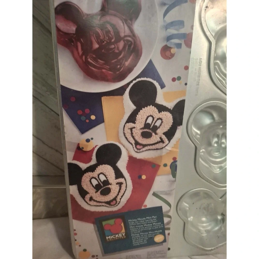 Mickey Mouse Mini Pan For Cakes. New . In Factory Seal. 6 shapes on pan.